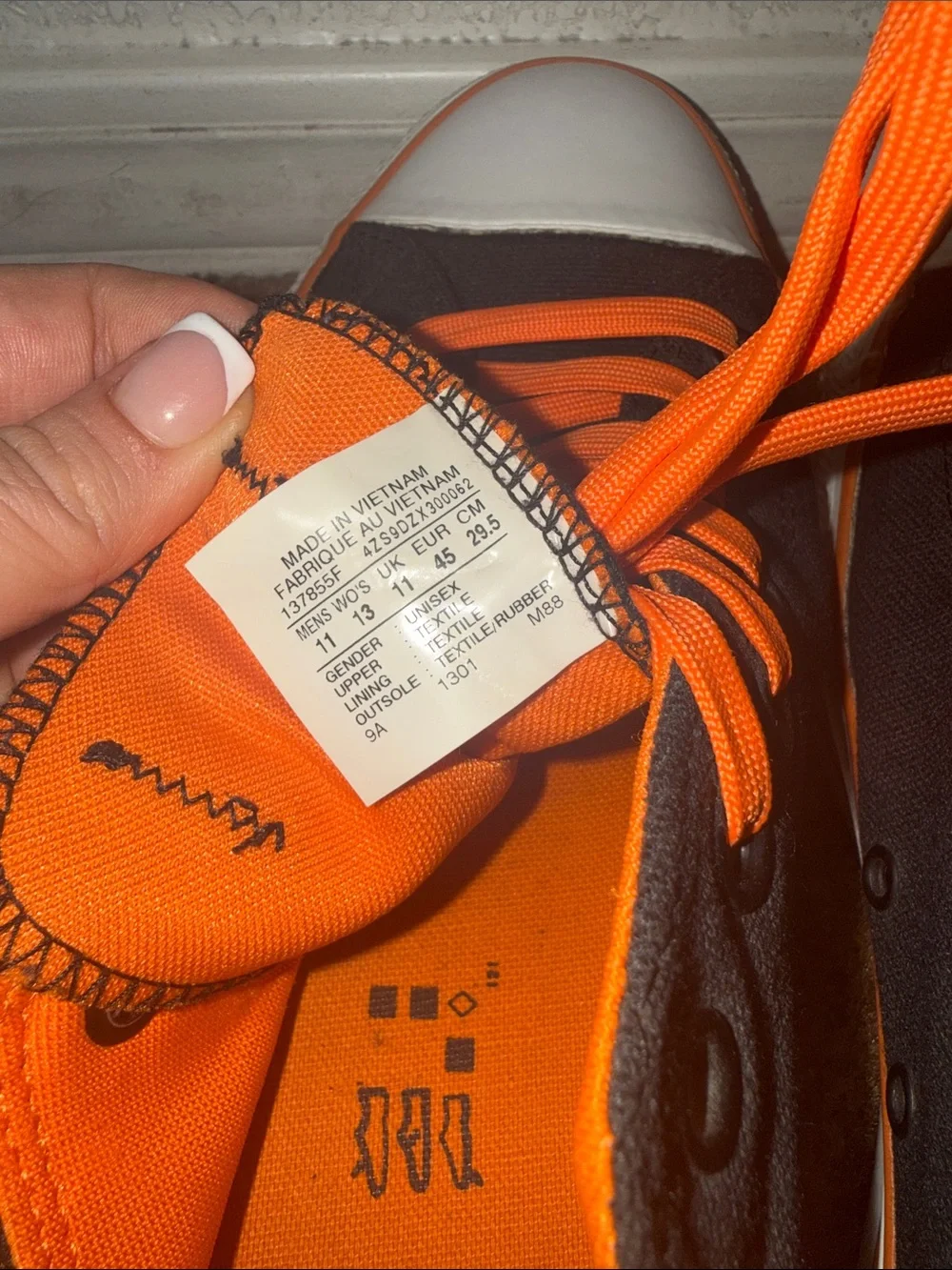 Converse Black Canvas Low-Top Sneakers with Bright Orange Laces